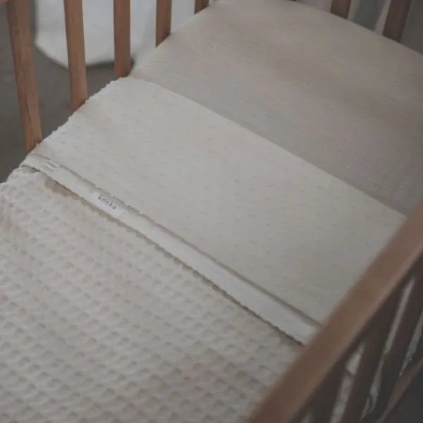 Koeka Ledikantdeken Cotton Fleece Wafel Amsterdam Sand> Ledikantdekens